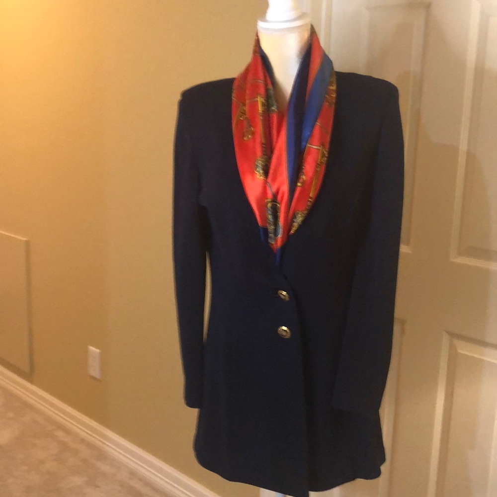 Vintage St.John’s knit jacket. Classic piece has a V closure. Gold buttons.